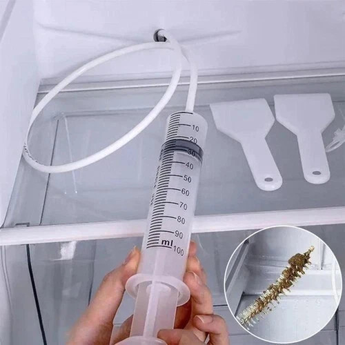 Refrigerator drain hole clog - refrigerator,